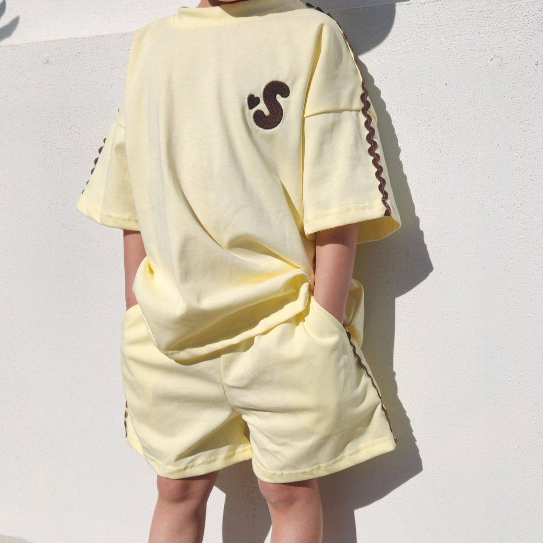 front view of a child wearing buttercup t-shirt and shorts set